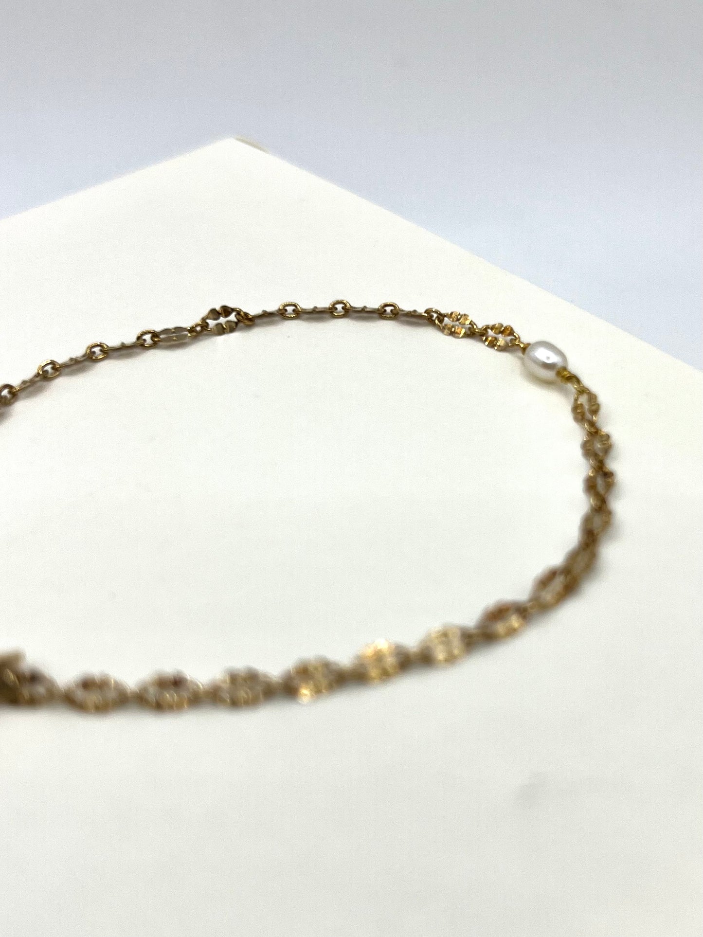 Bracciale in argento dorato con mini perla